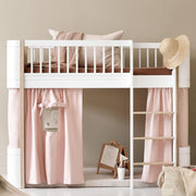 Oliver Furniture Wood Mini+ Cabin Curtains for Low Loft Bed, creating a cozy and stylish den for kids. 