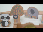 Wooden zoo animal figurines and accessories for Little Dutch Railway Train set, including elephant, giraffe, penguin, and other animals designed to enhance imaginative train track play.