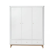 Oliver Furniture Wood Triple Wardrobe in white with oak accents features three doors, soft-close drawers, and flexible shelving for Nordic-style bedroom storage.