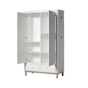 White and oak Nordic-style double wardrobe with hanging rail, adjustable shelves, soft-close drawers, and integrated side hooks for nursery and bedroom storage.