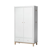 Oliver Furniture Wood Double Wardrobe in white with oak legs and leather pulls, featuring two doors, soft-close drawers, integrated side hooks, and Nordic-inspired design for nurseries and bedrooms.