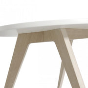 Close-up of the Oliver Furniture PingPong Kids Table, featuring a white tabletop and light oak legs, perfect for a children's room, nursery, or playroom. 