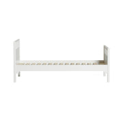White Nordic design Oliver Furniture Seaside Classic solid wood single bed for children with slatted base and safety rails, measuring 97x207x90cm.