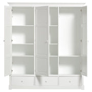 White triple wardrobe with three drawers, soft-close doors, adjustable shelves, and hanging space from Oliver Furniture's Seaside Collection.