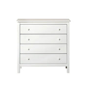 White Oliver Furniture Seaside 4 Drawer Dresser with soft-close drawers and porcelain handles, featuring Scandinavian design for nursery and bedroom storage.