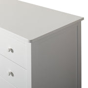 White Oliver Furniture Seaside 4 drawer chest of drawers with soft-close technology, porcelain handles, and Scandinavian design for modern bedrooms and nurseries.