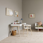 Oliver Furniture white and oak wood children's adjustable desk chair with height-adjustable seat, rounded back design, and lightly sloping legs for bedrooms and study spaces.